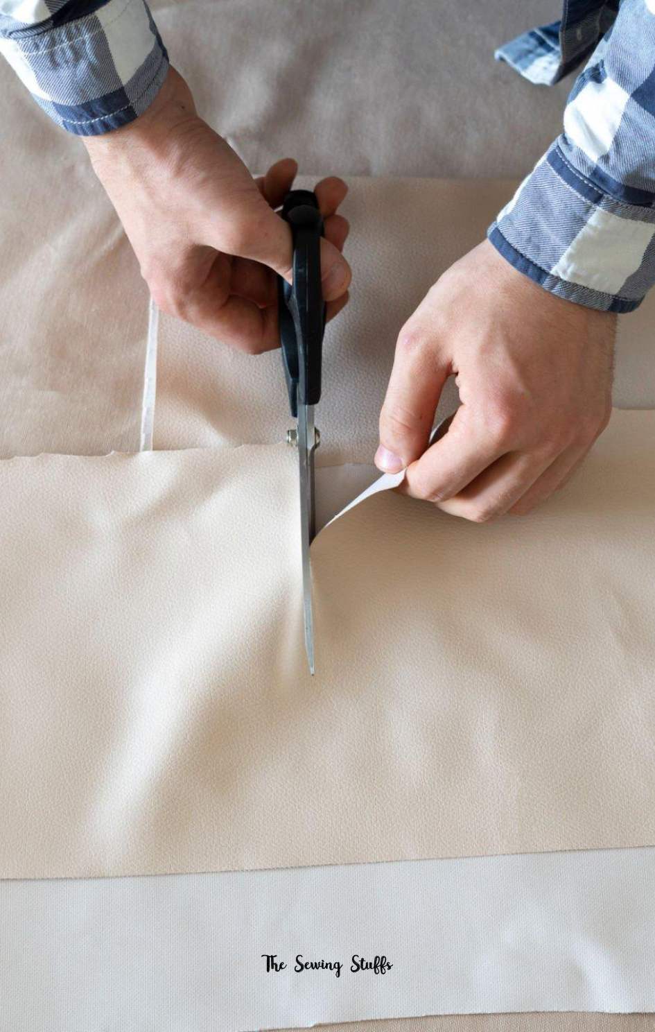 cut fabric in a straight line with scissors